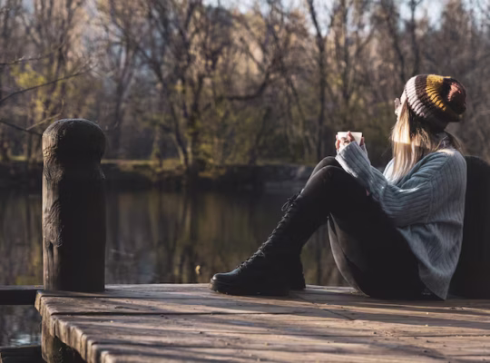 Woman enjoying a quiet moment outdoors