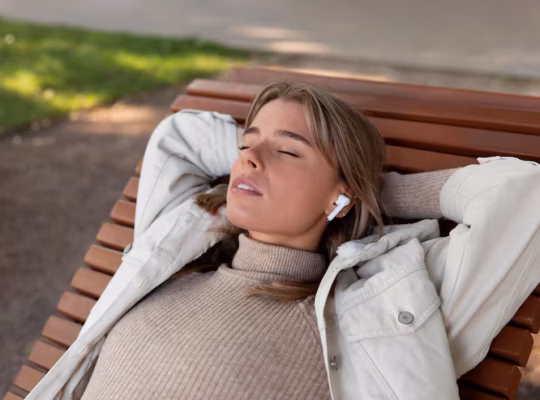 Person taking a quiet moment outdoors